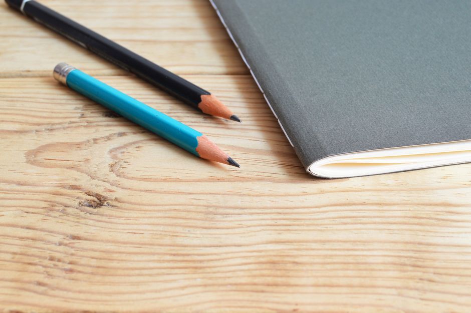 Notebook and pen on a desk